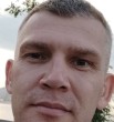 Николай