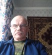 николай