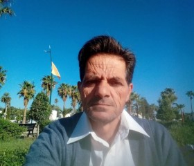 Zaher, 66, Nablus