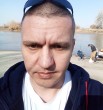 николай